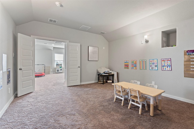 playroom featuring carpet and lofted ceiling