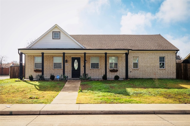 view of front of home with a front lawn and a porch