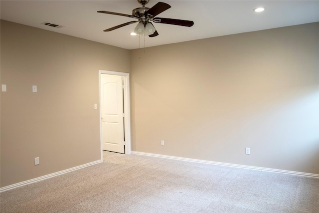 carpeted empty room with ceiling fan