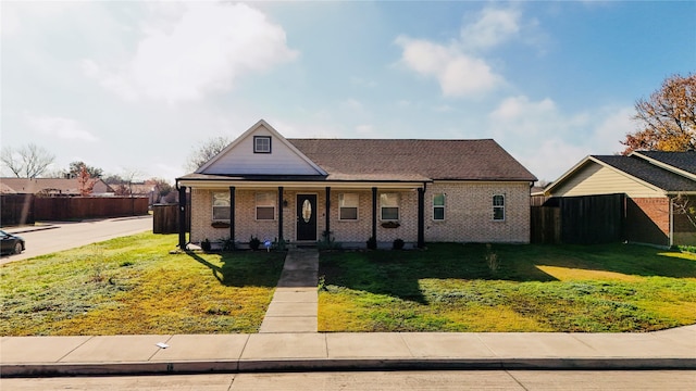 view of front of property with a front lawn