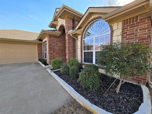 view of exterior entry featuring a garage