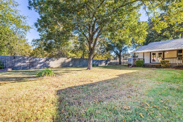 view of yard featuring a wooden deck