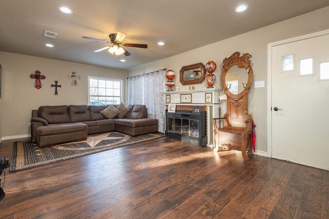 laundry area featuring electric dryer hookup, hookup for a washing machine, dark hardwood / wood-style flooring, and a textured ceiling