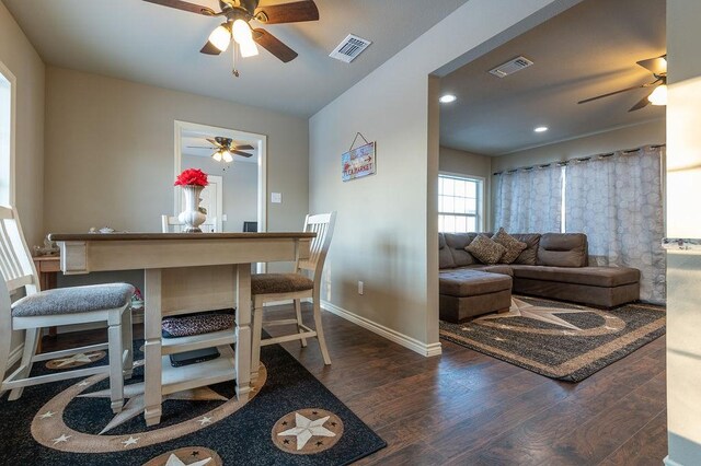 bathroom with a shower, vanity, toilet, and a notable chandelier