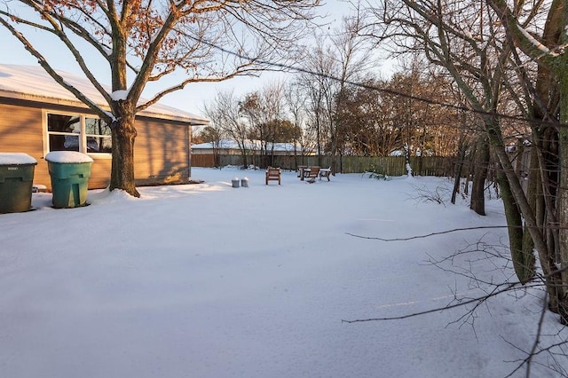 view of yard covered in snow