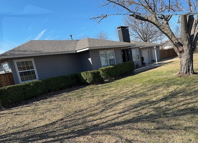 view of home's exterior with a lawn