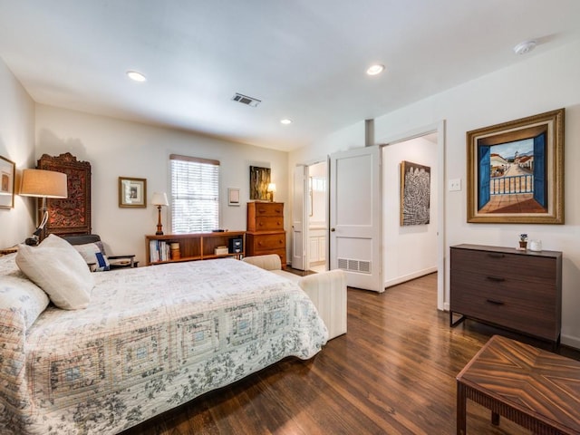 bedroom featuring dark wood-style floors, baseboards, visible vents, and recessed lighting