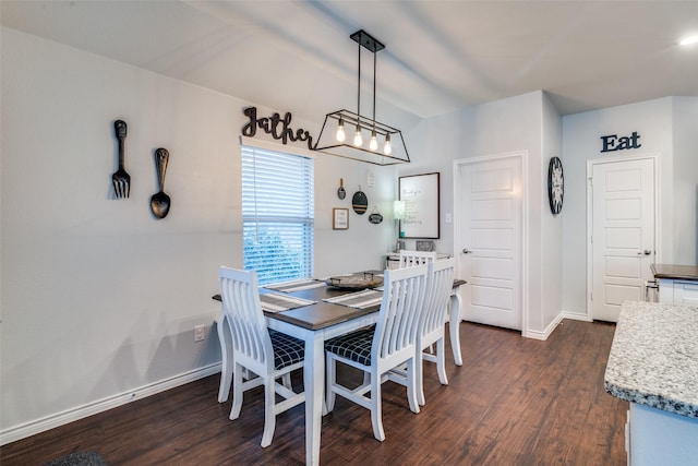 dining area with dark wood-type flooring