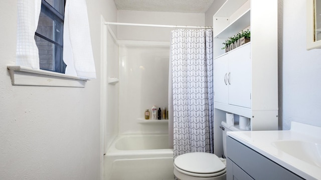 full bathroom with vanity, shower / bath combination with curtain, a textured ceiling, and toilet