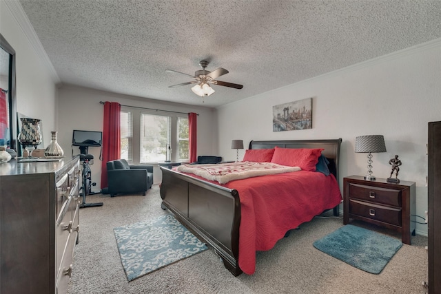 bedroom featuring ornamental molding, light colored carpet, ceiling fan, and a textured ceiling