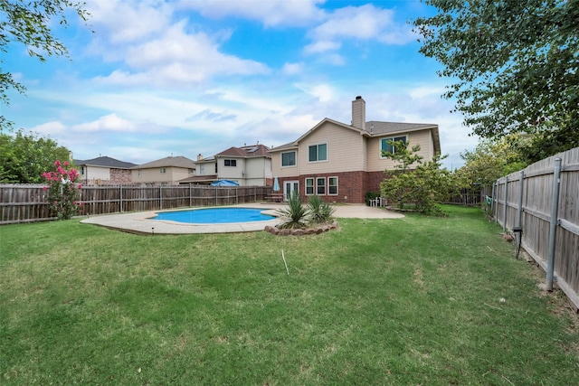 exterior space featuring a yard and a patio