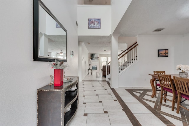 foyer featuring a textured ceiling