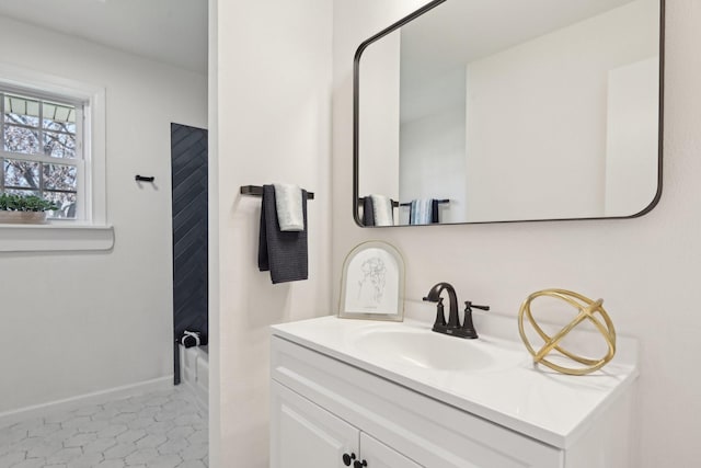 bathroom featuring tile patterned floors, shower / washtub combination, and vanity