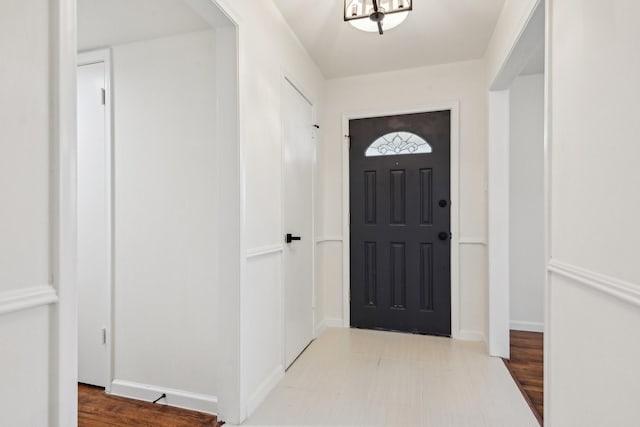 foyer entrance with light hardwood / wood-style flooring