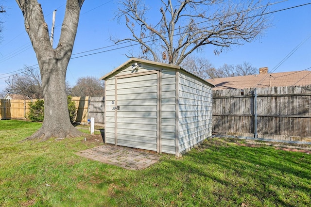 view of outdoor structure featuring a yard