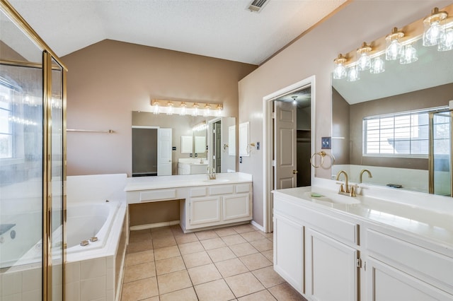 bathroom with tile patterned flooring, vanity, plus walk in shower, and lofted ceiling