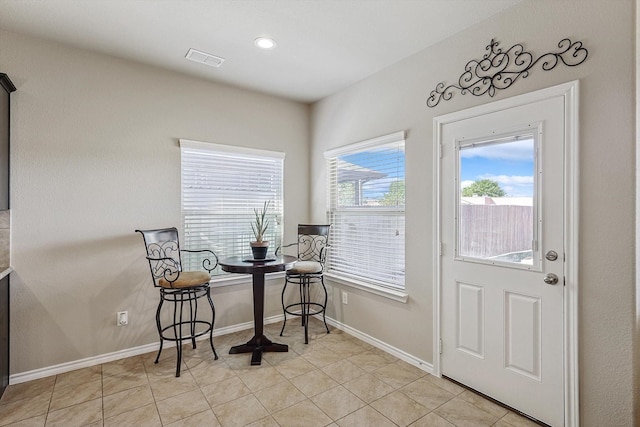 interior space with light tile patterned flooring