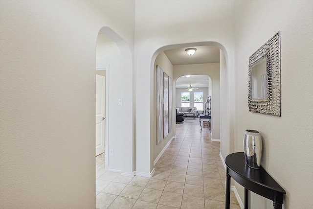 hallway with light tile patterned flooring