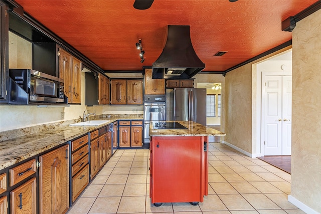 kitchen with stainless steel appliances, a center island, light tile patterned floors, ornamental molding, and sink