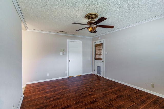 unfurnished room featuring a textured ceiling, ceiling fan, crown molding, and dark hardwood / wood-style floors