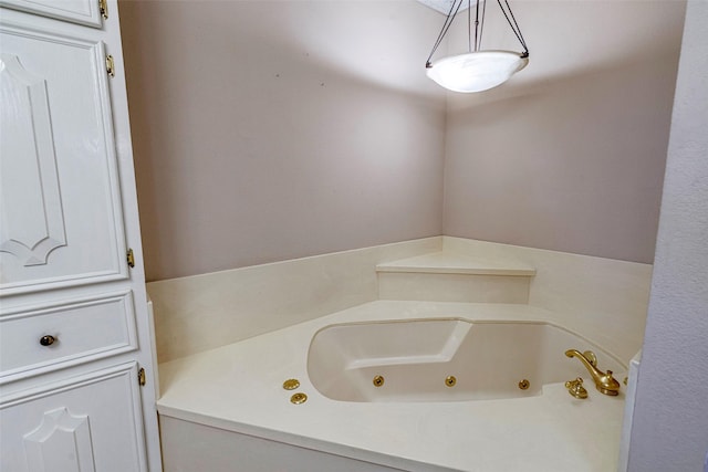 bathroom featuring a washtub