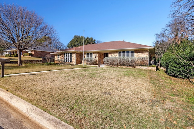 ranch-style house with a front yard