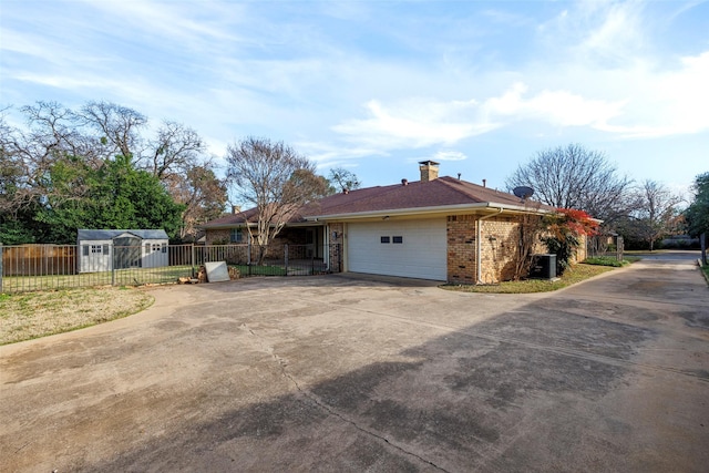 view of side of home featuring a garage