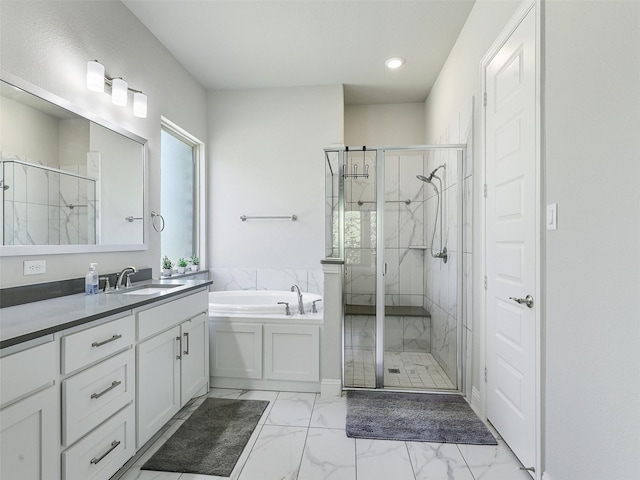 bathroom with plus walk in shower and vanity