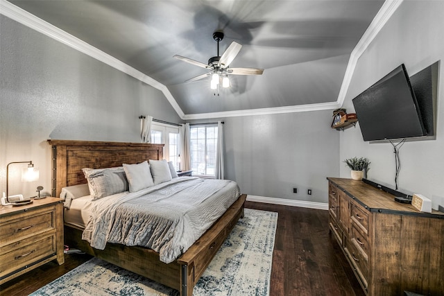 bedroom with ceiling fan, ornamental molding, dark wood-type flooring, and vaulted ceiling