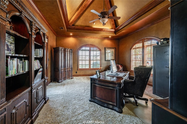 carpeted office featuring ceiling fan, crown molding, and a tray ceiling