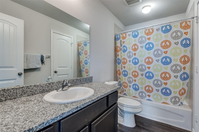 full bathroom with toilet, vanity, shower / bath combo, and hardwood / wood-style flooring