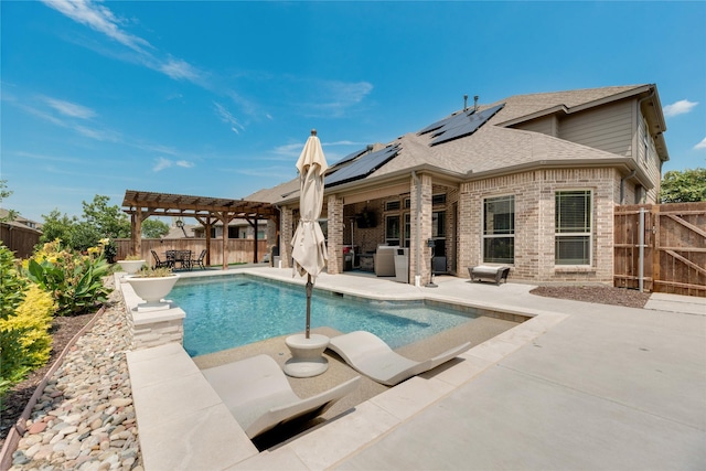 view of swimming pool with a pergola and a patio area