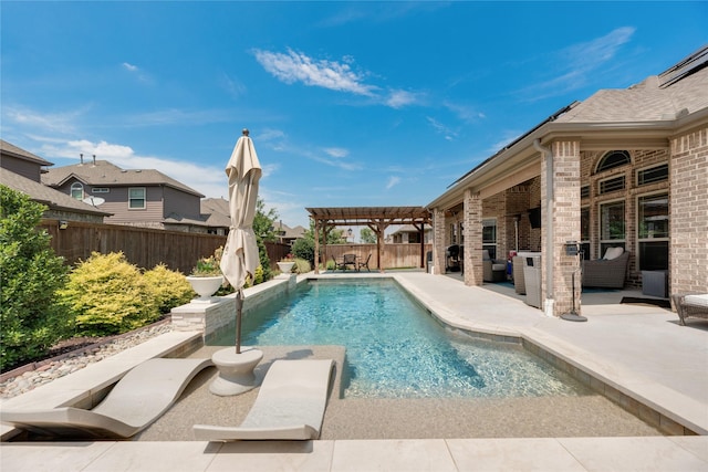 view of swimming pool with a pergola, an outdoor living space, and a patio