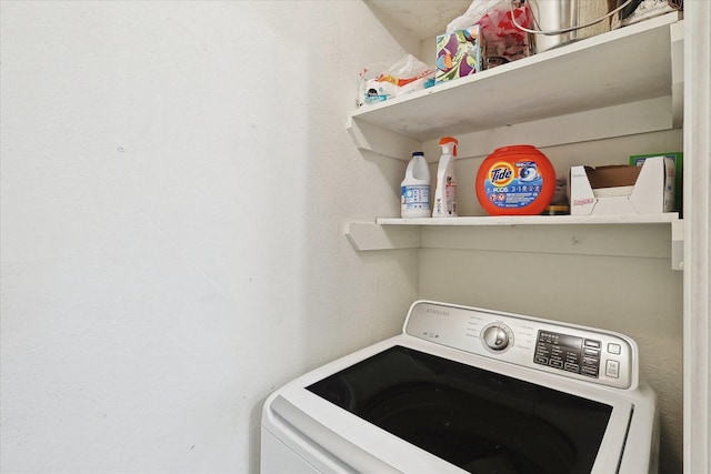 washroom featuring washer / dryer