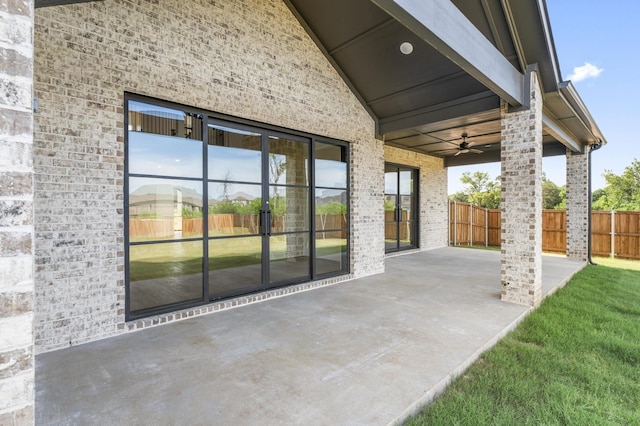 view of patio / terrace featuring ceiling fan