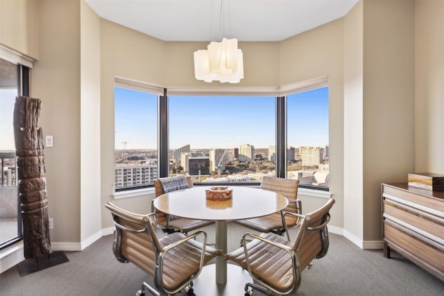 view of carpeted dining space