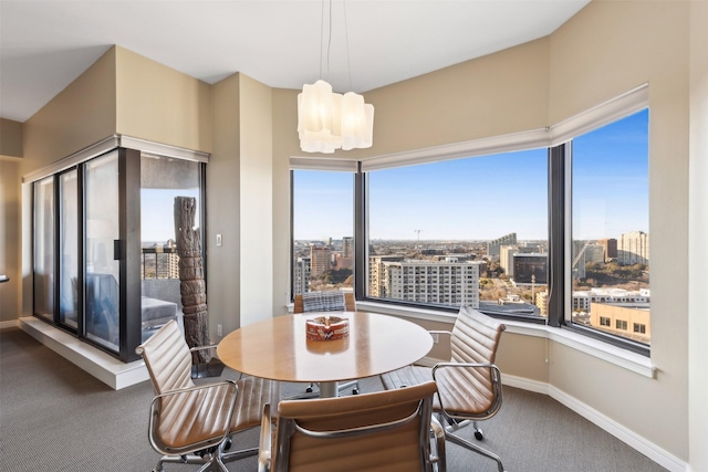 view of carpeted dining space