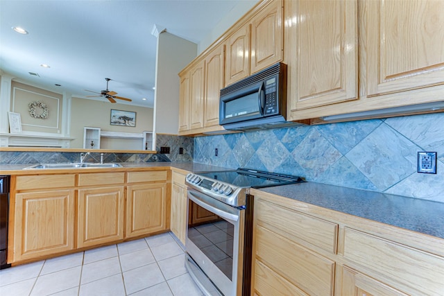 kitchen featuring sink, light brown cabinets, backsplash, light tile patterned floors, and black appliances