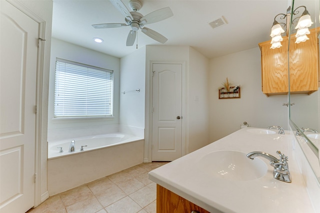 bathroom with tile patterned floors, vanity, ceiling fan, and a bath