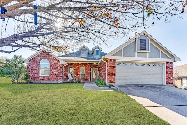 view of front facade with a garage and a front lawn