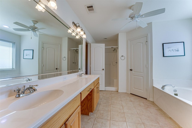 bathroom with tile patterned flooring, vanity, separate shower and tub, and ceiling fan