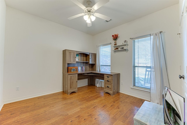 home office featuring ceiling fan and light wood-type flooring