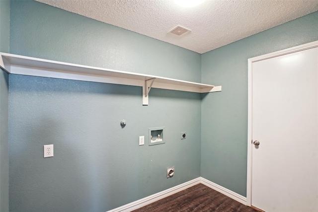 laundry area featuring washer hookup, hardwood / wood-style floors, a textured ceiling, and electric dryer hookup