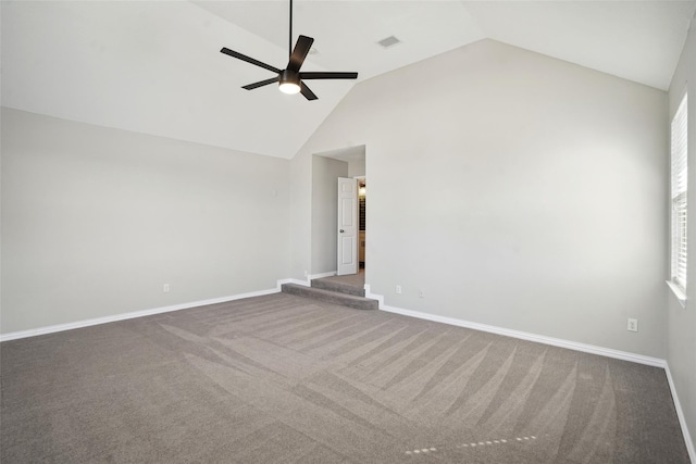 empty room with carpet flooring, ceiling fan, and lofted ceiling