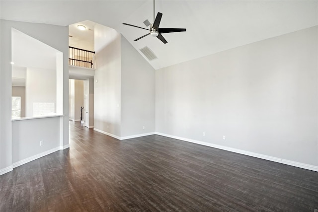 unfurnished room with ceiling fan, high vaulted ceiling, and dark wood-type flooring