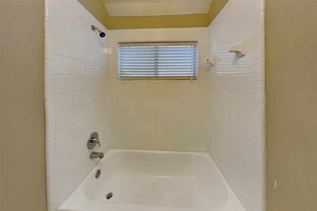 full bathroom featuring toilet, vanity, and washtub / shower combination