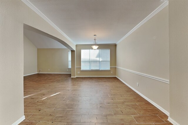 unfurnished dining area with crown molding