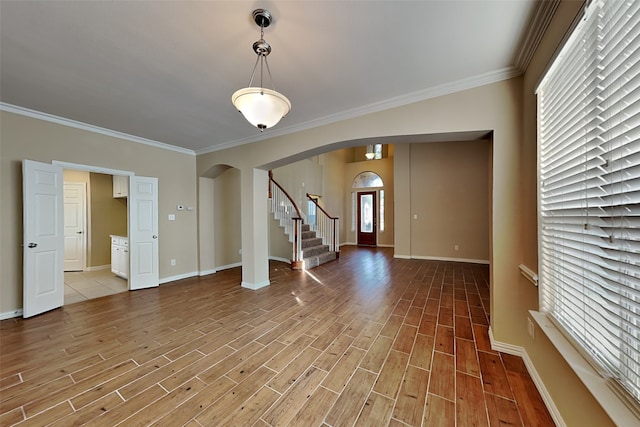 interior space with a wealth of natural light and crown molding