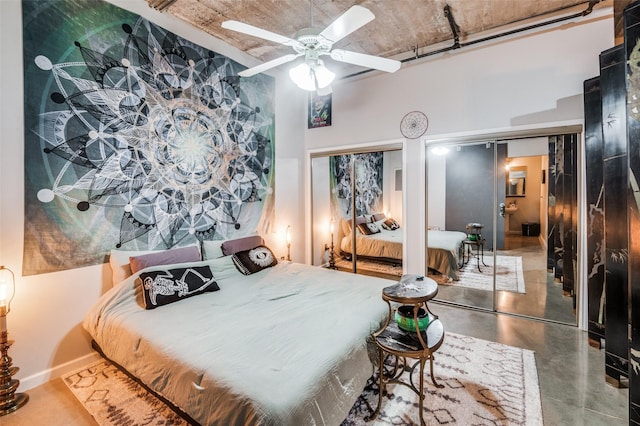 bedroom featuring concrete floors and ceiling fan