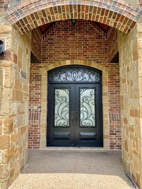 doorway to property featuring french doors